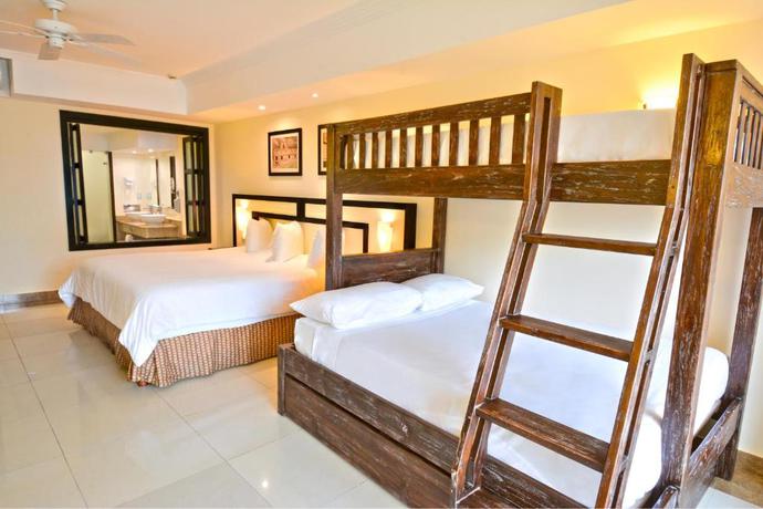 Imagen de la habitación del Hotel Sandos Playacar Beach Resort. Foto 10