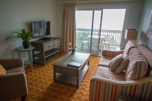 Imagen de la habitación del Hotel Sandpebble Beach Club Surfside Beach A Ramada By Wyndham. Foto 4