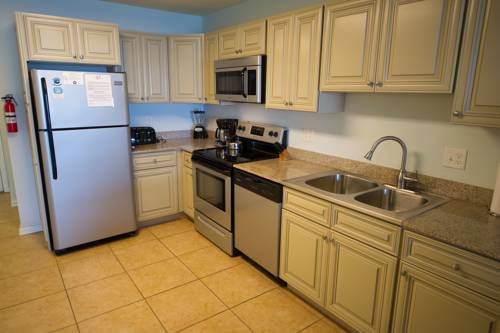 Imagen de la habitación del Hotel Sandpebble Beach Club Surfside Beach A Ramada By Wyndham. Foto 14