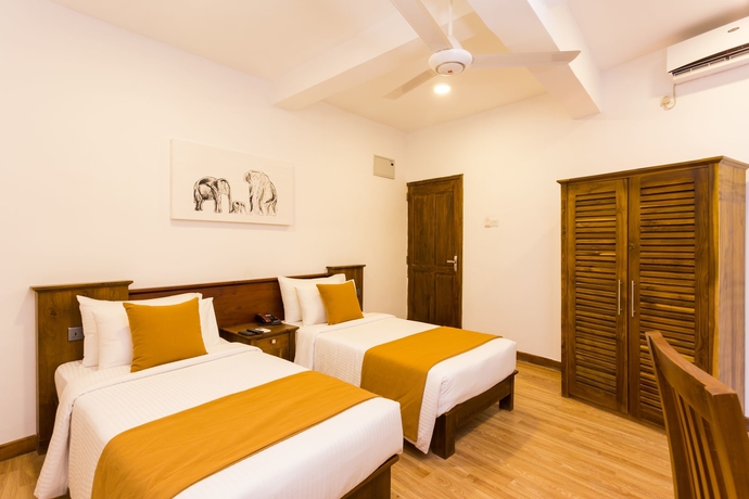 Imagen de la habitación del Hotel Sandriana Lake View. Foto 7