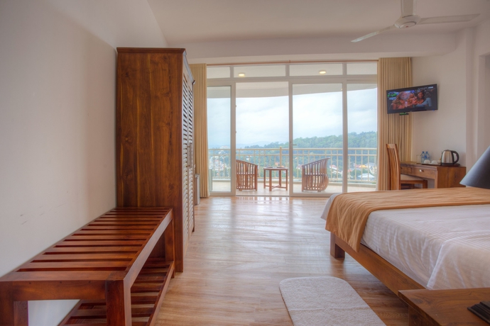 Imagen de la habitación del Hotel Sandriana Lake View. Foto 9