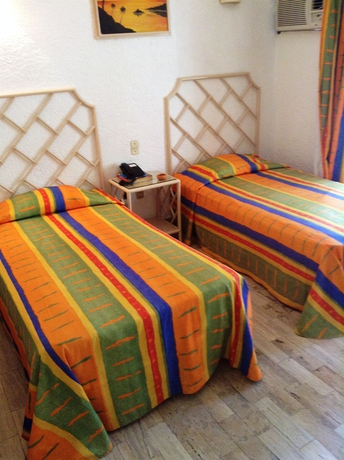 Imagen de la habitación del Hotel Sands Acapulco and Bungalows. Foto 5