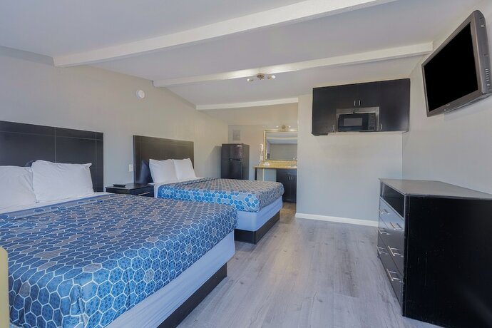 Imagen de la habitación del Hotel Sands Inn by OYO Winnie. Foto 16