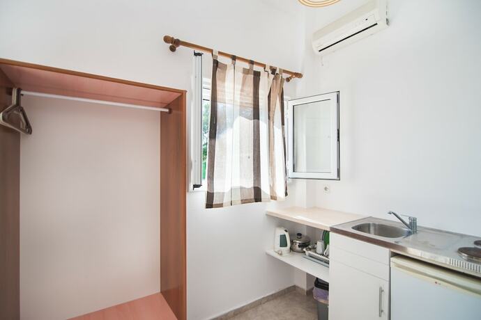 Imagen de la habitación del Hotel Sandy Beach Annexe. Foto 14