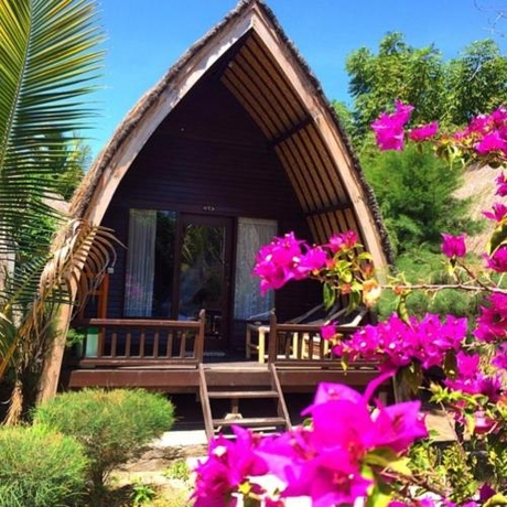 Imagen de la habitación del Hotel Sandy Beach Bungalows. Foto 6