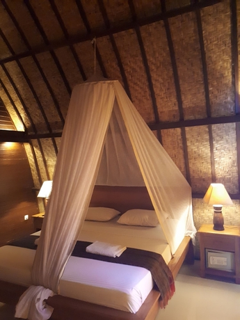 Imagen de la habitación del Hotel Sandy Beach Bungalows. Foto 2