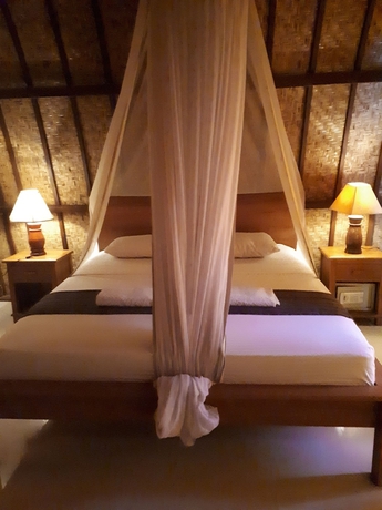 Imagen de la habitación del Hotel Sandy Beach Bungalows. Foto 3