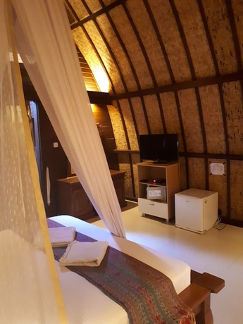 Imagen de la habitación del Hotel Sandy Beach Bungalows. Foto 6