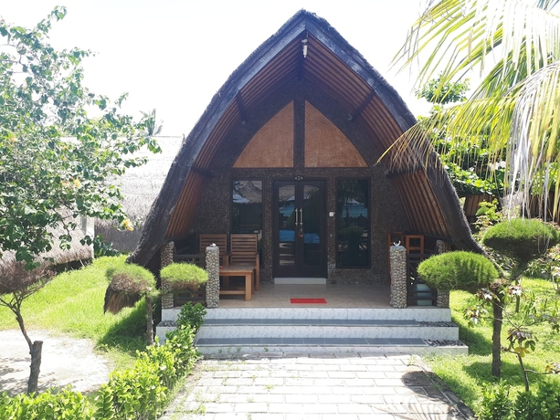 Imagen de la habitación del Hotel Sandy Beach Bungalows. Foto 8