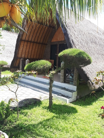 Imagen de la habitación del Hotel Sandy Beach Bungalows. Foto 9