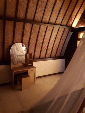 Imagen de la habitación del Hotel Sandy Beach Bungalows. Foto 18