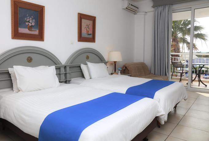 Imagen general del Hotel Sandy Beach Resort, Aghios Georgios (Sur). Foto 7