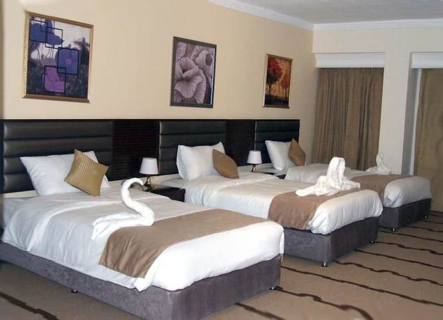 Imagen de la habitación del Hotel Sandy Prime. Foto 15