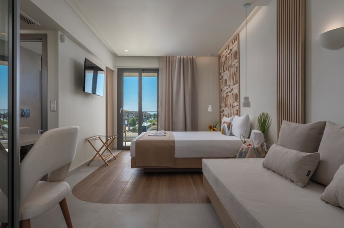 Imagen de la habitación del Hotel Sandy Seaside Suites. Foto 2