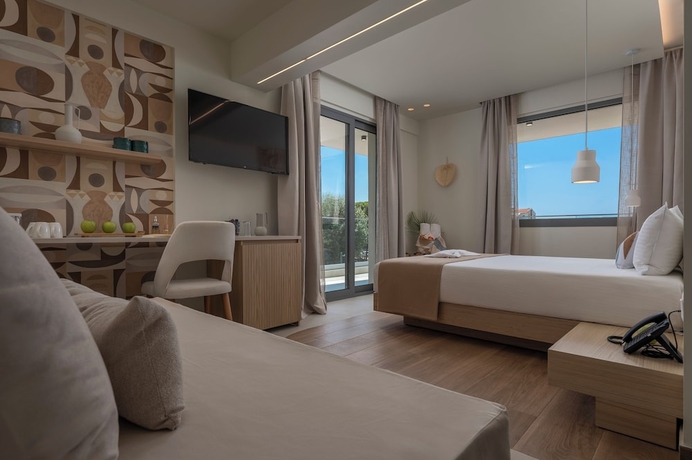 Imagen de la habitación del Hotel Sandy Seaside Suites. Foto 4