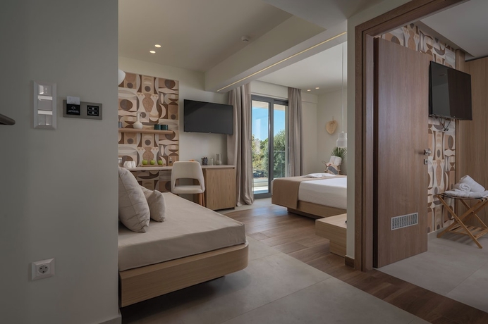 Imagen de la habitación del Hotel Sandy Seaside Suites. Foto 5