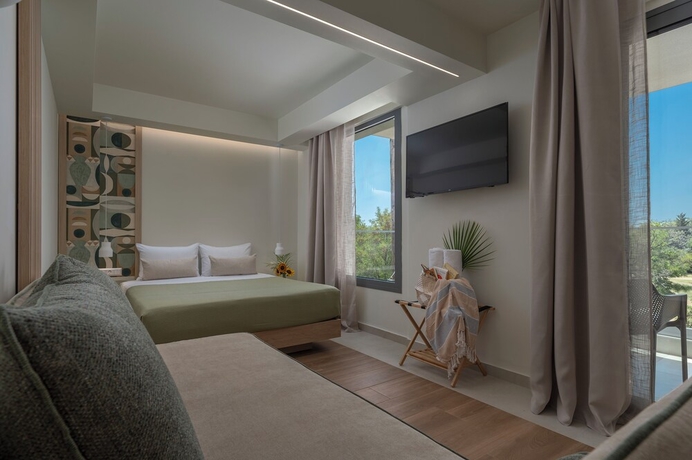 Imagen de la habitación del Hotel Sandy Seaside Suites. Foto 10