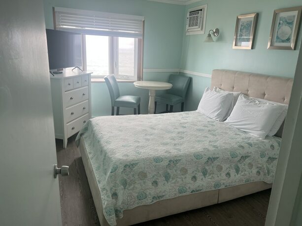 Imagen de la habitación del Hotel Sandy Shore Motel. Foto 18