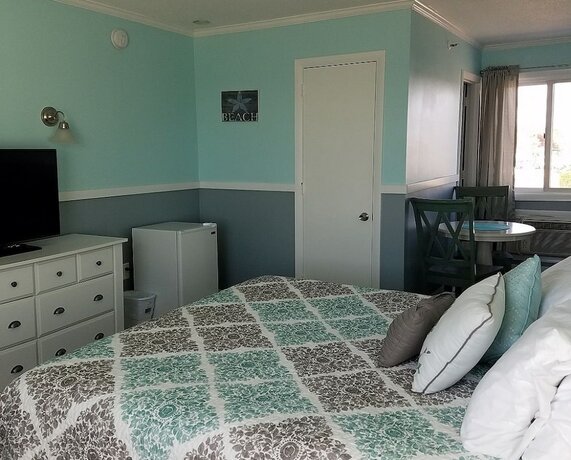 Imagen de la habitación del Hotel Sandy Shore Motel. Foto 19