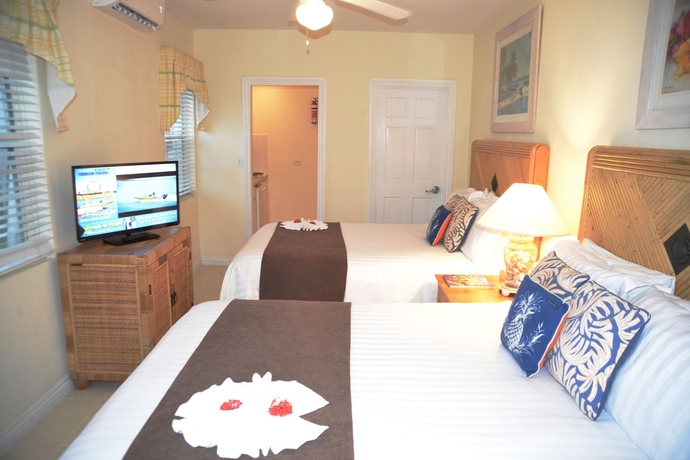 Imagen de la habitación del Hotel Sandyport Beach Resort. Foto 7