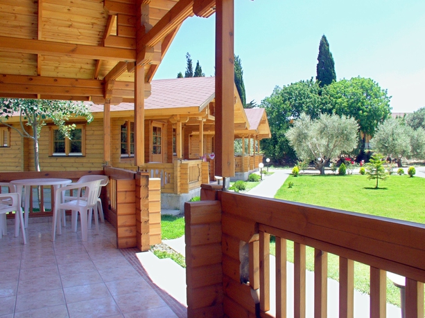 Imagen de la habitación del Hotel Sandy's Studios Apartments and Log Villas. Foto 4