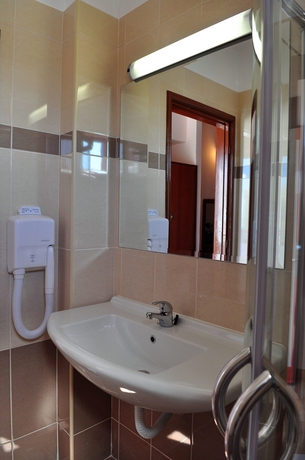 Imagen de la habitación del Hotel Sandy's Studios Apartments and Log Villas. Foto 8