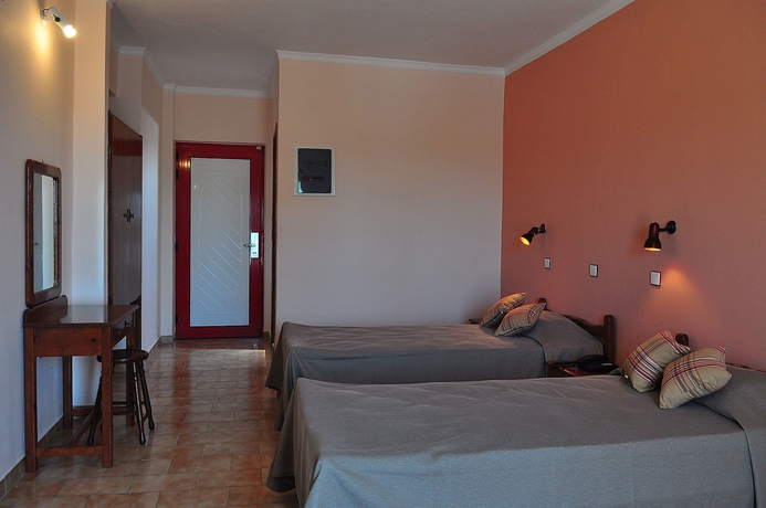 Imagen de la habitación del Hotel Sandy's Studios Apartments and Log Villas. Foto 11