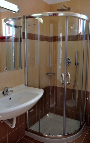 Imagen de la habitación del Hotel Sandy's Studios Apartments and Log Villas. Foto 12