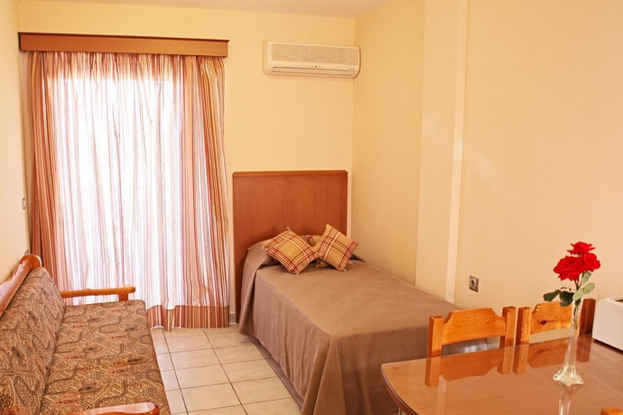 Imagen de la habitación del Hotel Sandy's Studios Apartments and Log Villas. Foto 13