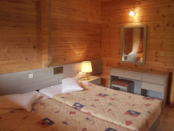 Imagen de la habitación del Hotel Sandy's Studios Apartments and Log Villas. Foto 15