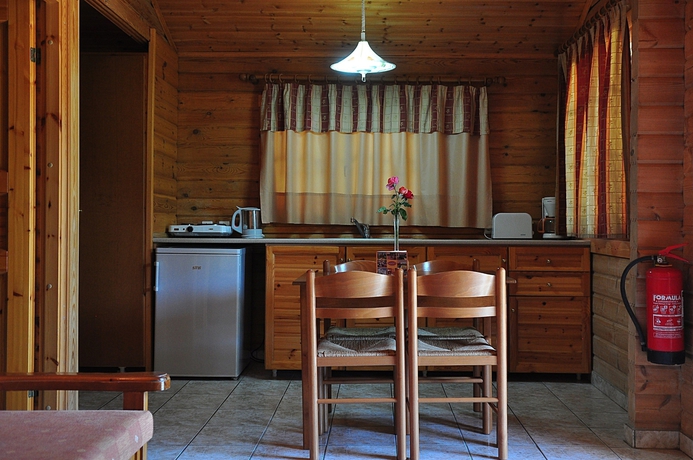 Imagen de la habitación del Hotel Sandy's Studios Apartments and Log Villas. Foto 17