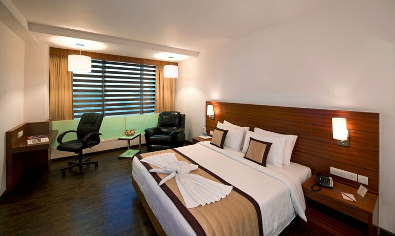 Imagen de la habitación del Hotel Sandy's Tower. Foto 15