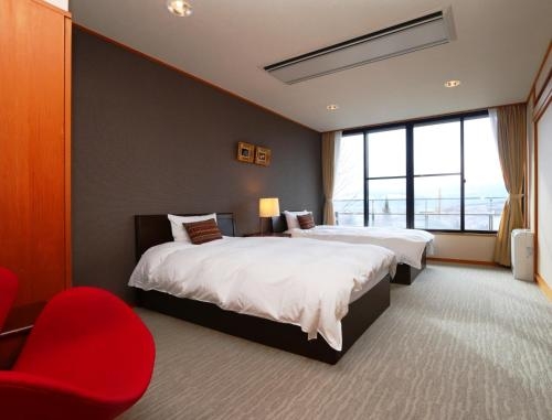 Imagen de la habitación del Hotel Saneikaku. Foto 6