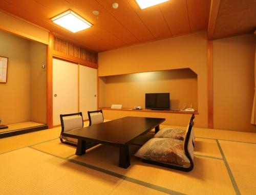 Imagen de la habitación del Hotel Saneikaku. Foto 7