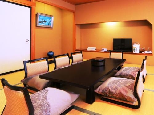Imagen de la habitación del Hotel Saneikaku. Foto 8