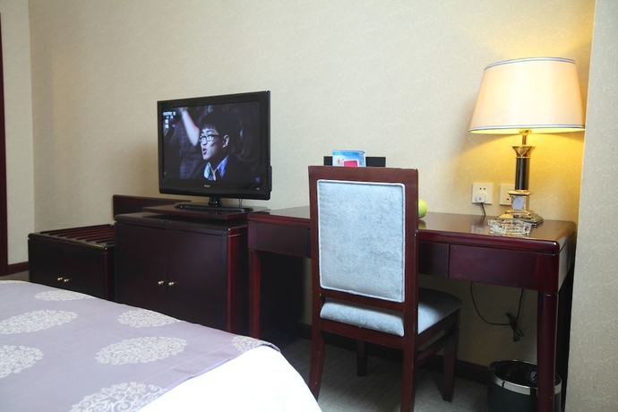 Imagen de la habitación del Hotel Sanfod Qingdao. Foto 2