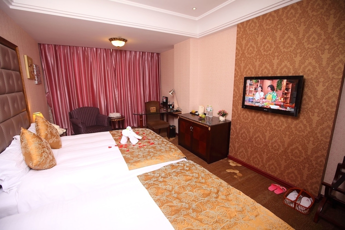 Imagen de la habitación del Hotel Sanfod Qingdao. Foto 3