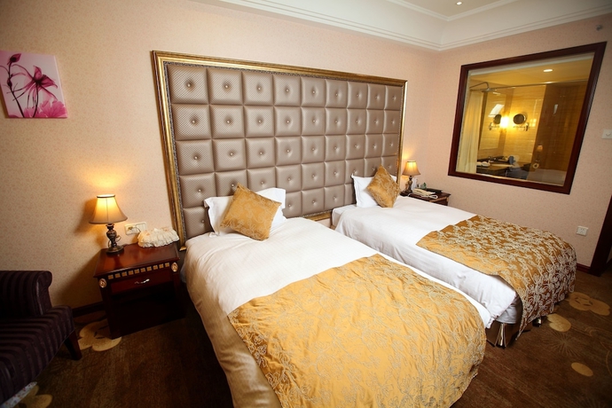 Imagen de la habitación del Hotel Sanfod Qingdao. Foto 4