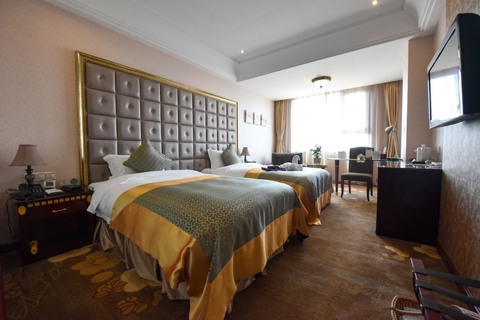 Imagen de la habitación del Hotel Sanfod Qingdao. Foto 5