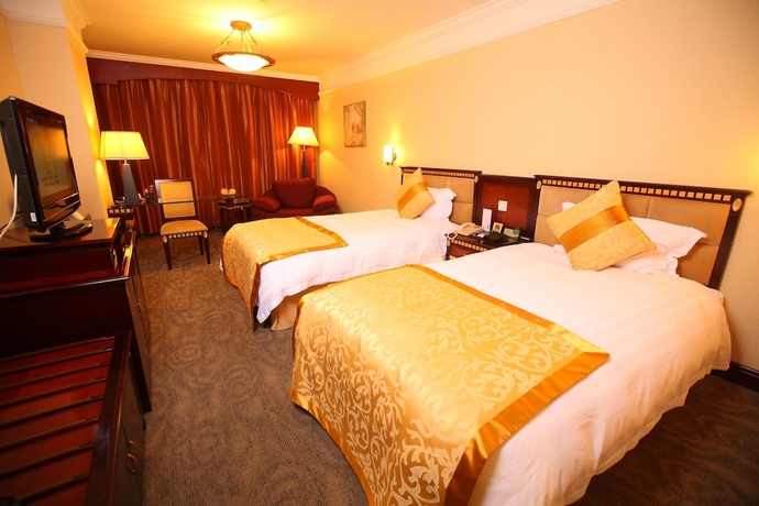 Imagen de la habitación del Hotel Sanfod Qingdao. Foto 6