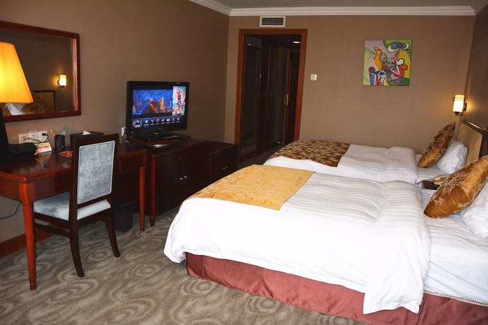 Imagen de la habitación del Hotel Sanfod Qingdao. Foto 7