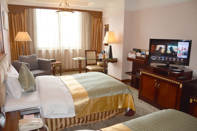 Imagen de la habitación del Hotel Sanfod Qingdao. Foto 8