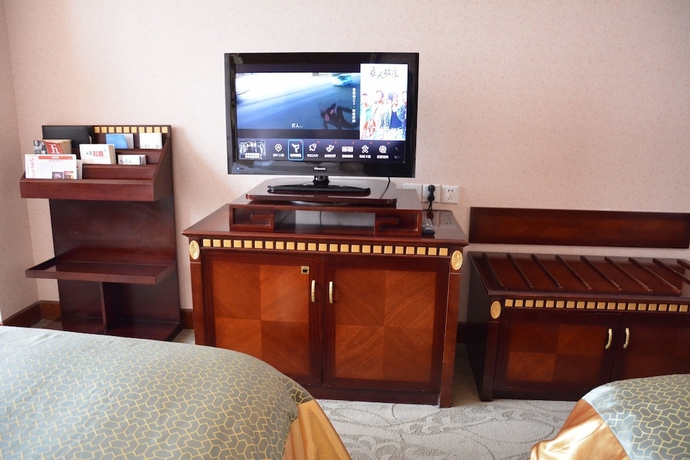 Imagen de la habitación del Hotel Sanfod Qingdao. Foto 9