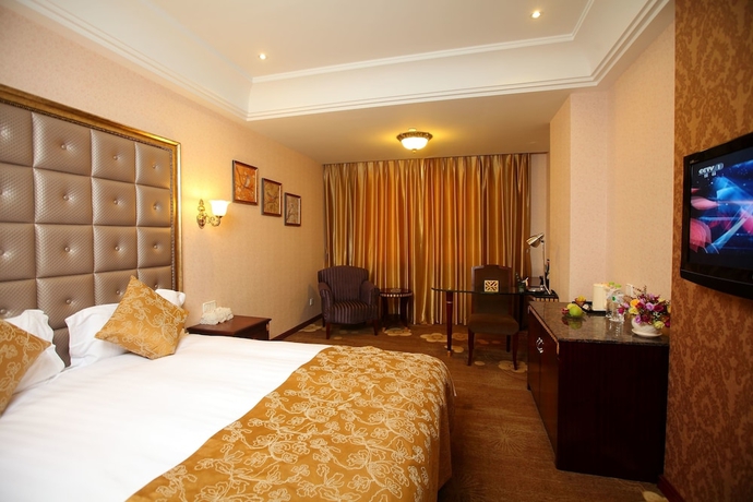 Imagen de la habitación del Hotel Sanfod Qingdao. Foto 11