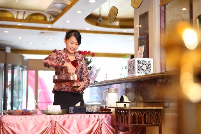 Imagen de los interiores del Hotel Sanfod Qingdao. Foto 19