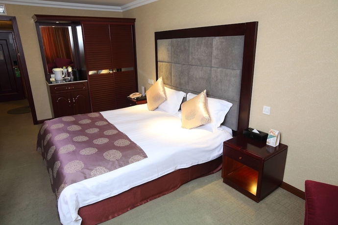 Imagen de la habitación del Hotel Sanfod Qingdao. Foto 12