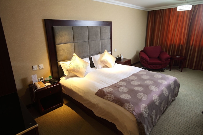 Imagen de la habitación del Hotel Sanfod Qingdao. Foto 13