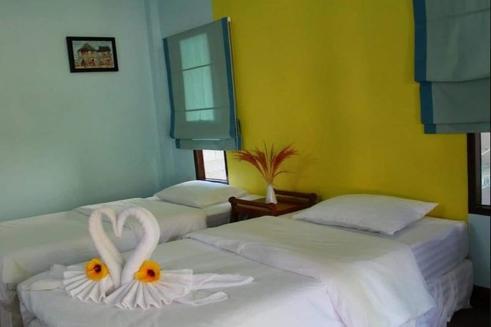 Imagen de la habitación del Hotel Sang Aroon Bungalow. Foto 11