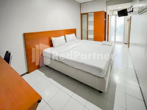 Imagen de la habitación del Hotel Sang Surya GuestHouse Near RS Hasan Sadikin. Foto 20