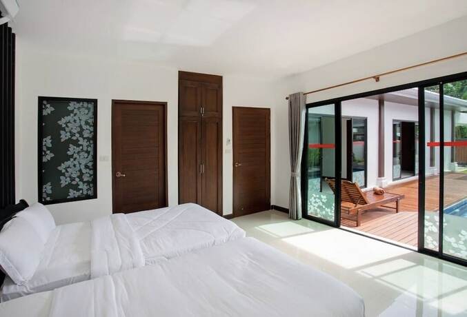 Imagen de la habitación del Hotel Sanga Villas. Foto 17